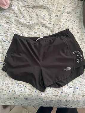 women’s black north face shorts, size medium